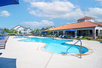 Resort-style swimming pool with sundeck